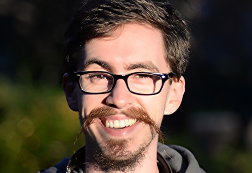 Photgraph of assistant professor Johanthan Balkind.