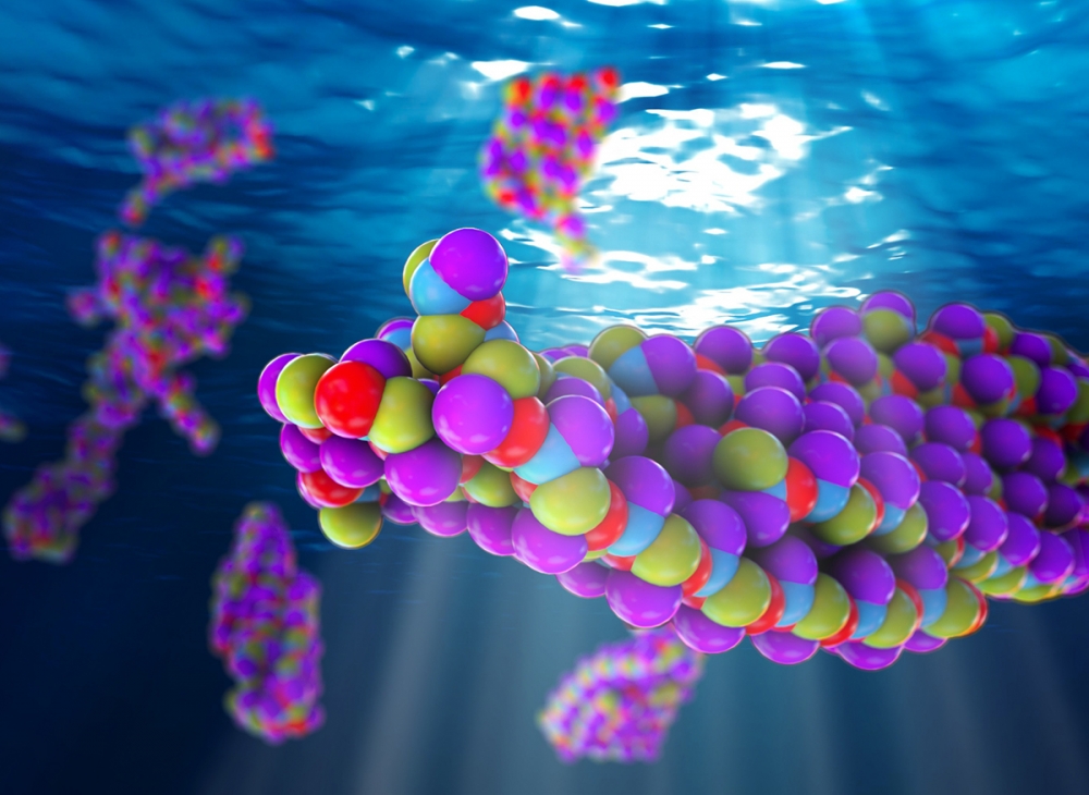 An Artist's interpretation of peptides composed of molecular groups in specific patterns self-assembling into functional structures