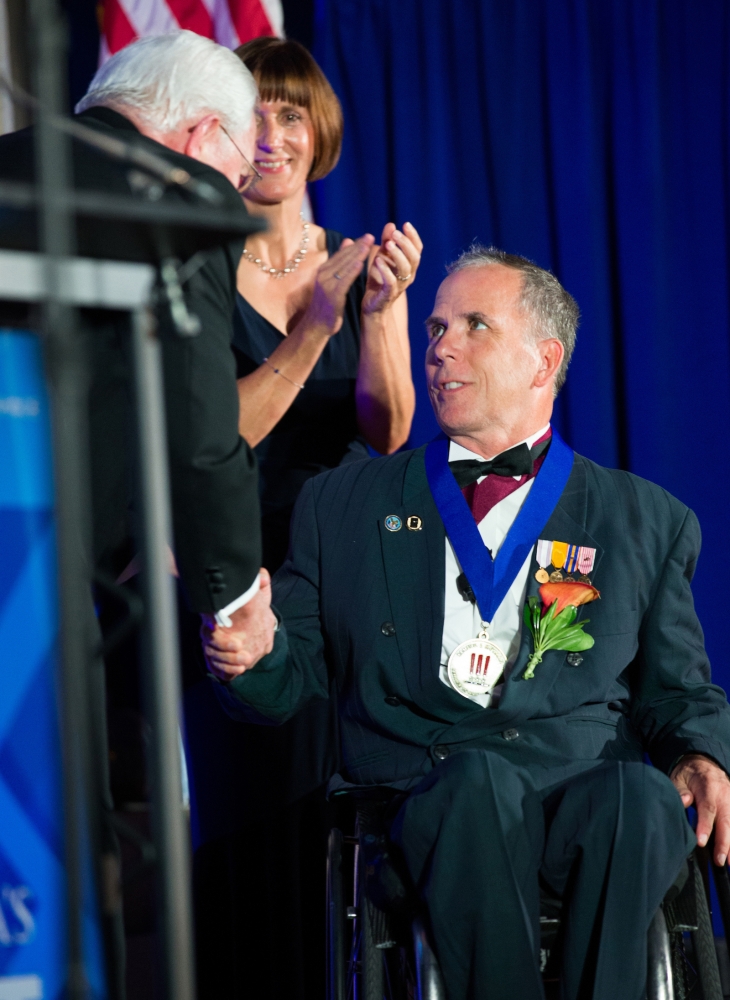Dr. Cooper receiving his Sammies medal, which was presented by the Deputy Secretary of the U.S. Department of Veterans Affairs, Thomas Bowman